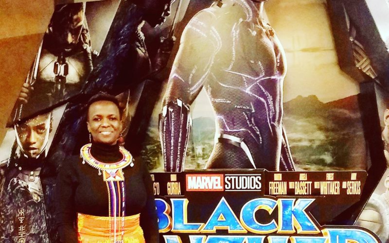 Posing in front of Black Panther movie display